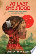 Cover of At Last She Stood: How Joey Guerrero Spied, Survived, and Fought for Freedom